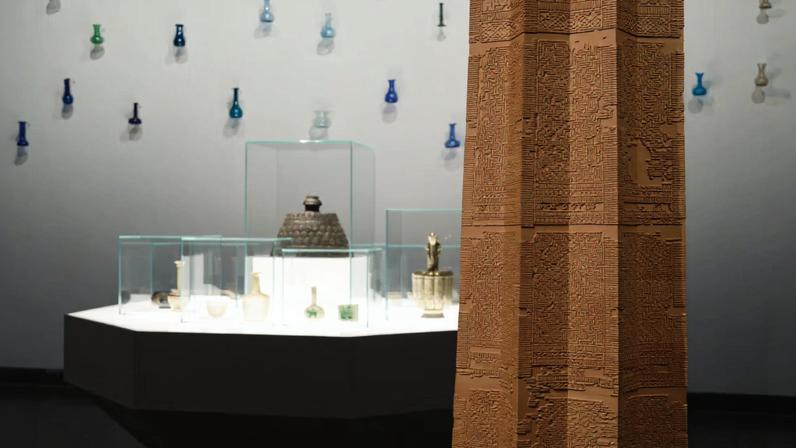 Installation view with an early 13th-century ewer (Ghurid or Ilkhanid period) with silver and copper inlaid decoration displayed on the far right