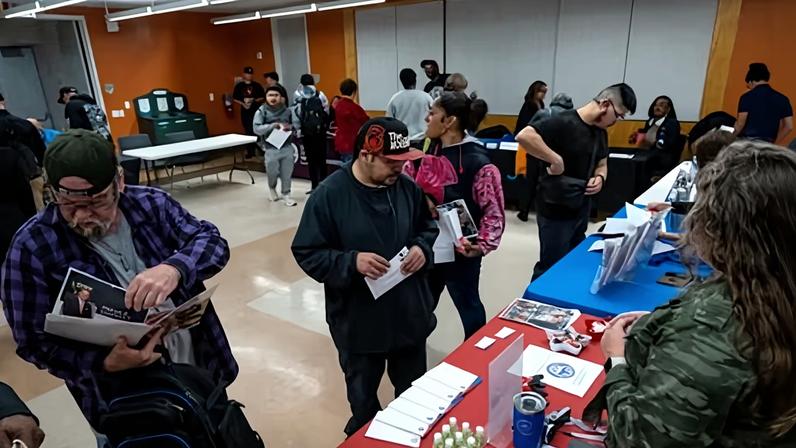 People at a career fair in San Francisco, California, on 13 August 2025.