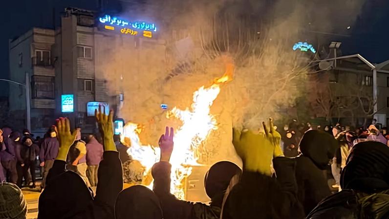 Iranians attend an anti-government protest in Tehran on 9 January