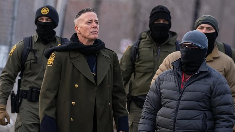 Gregory Bovino with federal agents outside Whipple building in Minnesota last month.