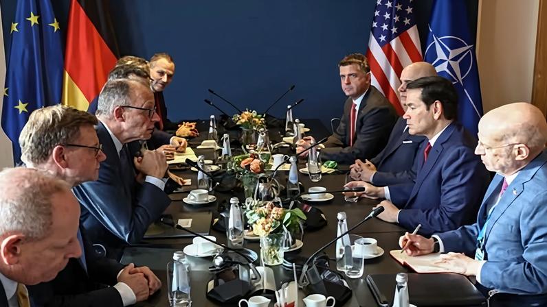 The German chancellor, Friedrich Merz, and foreign minister, Johann Wadephul (second left), meet the US secretary of state, Marco Rubio, at the Munich Security Conference.