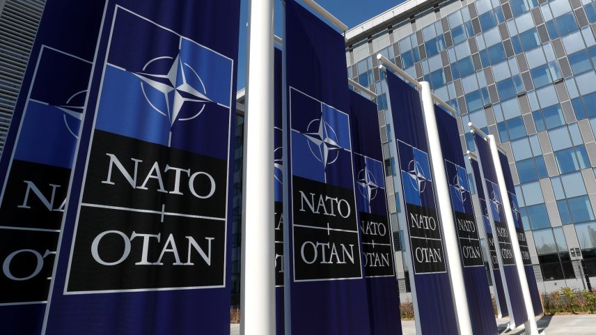 Banners displaying the NATO logo are placed at the entrance of new NATO headquarters during the move to the new building, in Brussels, Belgium April 19, 2018. REUTERS/Yves Herman