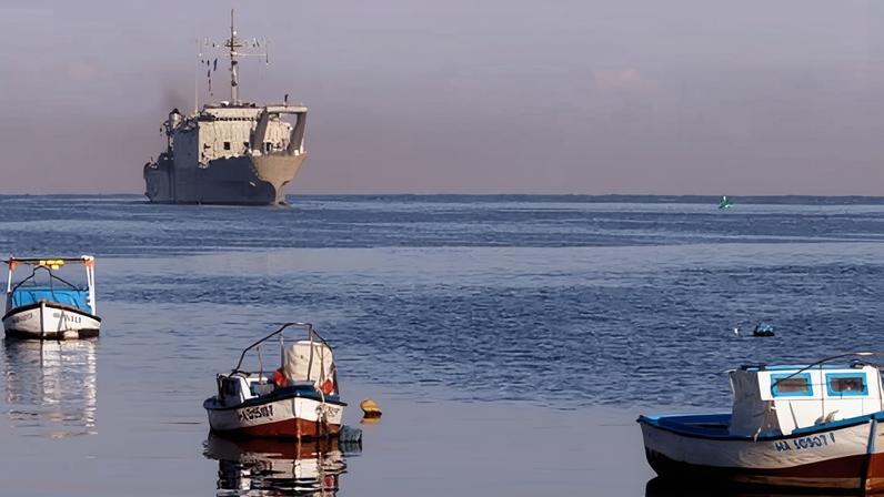 Small boats sail in front of a Mexican humanitarian aid ship in the port of Havana, Cuba, on Thursday.