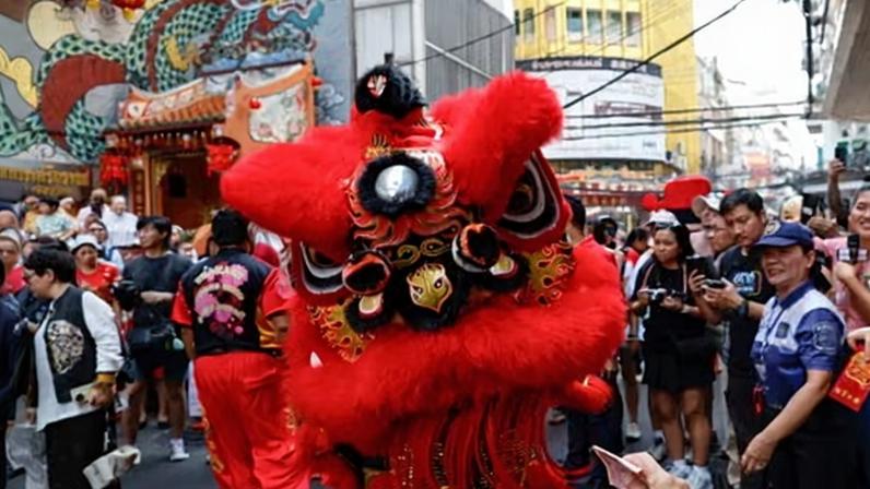 Lion dancers perform during lunar new year celebrations in Bangkok, Thailand, this week.