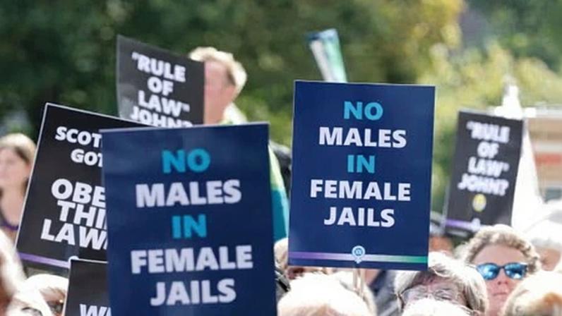 Supporters of For Women Scotland protesting outside the Scottish parliament in September.