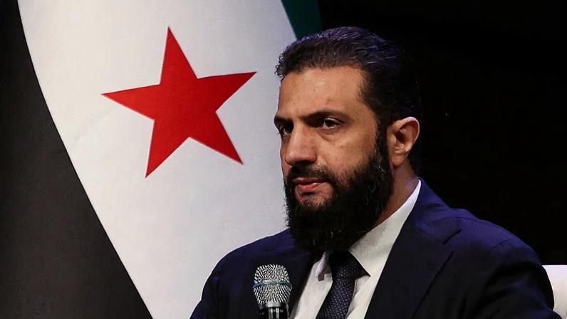 Syrian President Ahmed al-Sharaa attends the Ministry of Awqaf conference titled "Unity of Islamic Discourse" at the Conference Palace in Damascus, Syria, February 16, 2026. REUTERS/Khalil Ashawi/File Photo