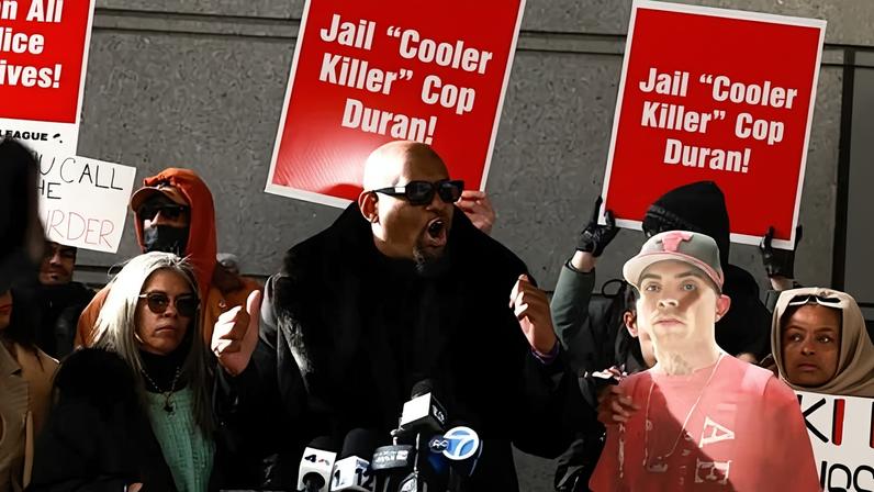 Gretchen Sotoaw, the mother of Eric Duprey, stands beside a speaker outside Bronx criminal court in New York City on Friday.