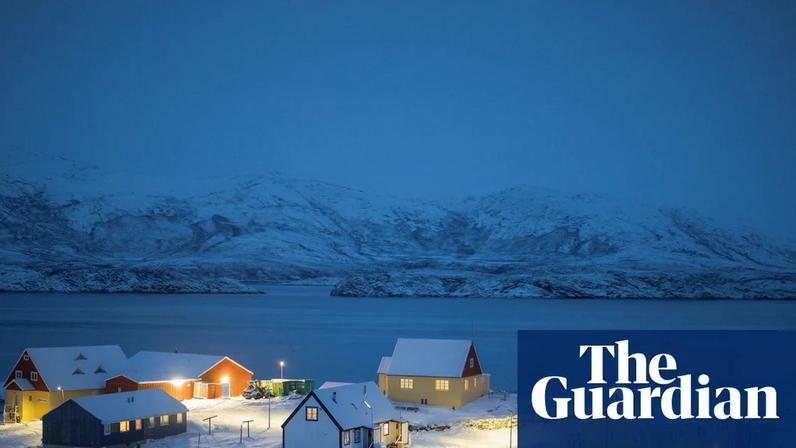 Lights illuminate the village of Kapisillit, Greenland. Photograph: Marko Đurica/Reuters