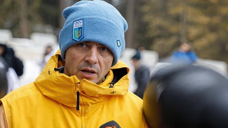 Ukraine's Vladyslav Heraskevych speaks to members of the media after being disqualified from the Winter Olympics skeleton.