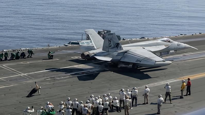 Flight operations on the aircraft carrier USS Abraham Lincoln in the Arabian Sea amid the US military buildup and fears of an attack on Iran.