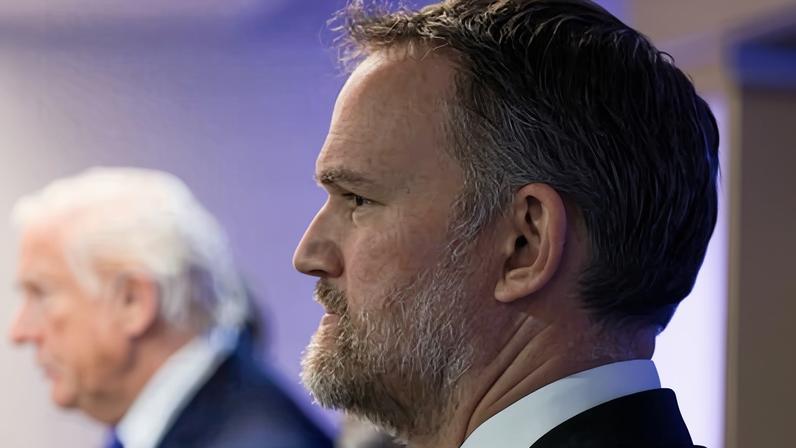 Jamieson Greer listens as Donald Trump speaks at a press briefing held at the White House on 20 February in Washington DC.