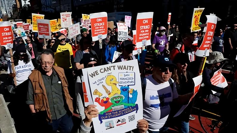 Teachers, educators and supporters rally and march on the fourth day of the strike in San Francisco, California, on Thursday.