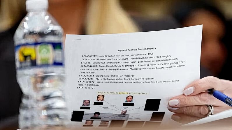 Pam Bondi holds a file labeled ‘Jayapal Pramila Search History’ at a House hearing in Washington DC on 11 February 2026.