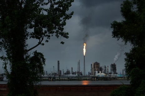 A gas flare from the Shell Chemical LP petroleum refinery illuminates the sky on 21 August 2019 in Norco, Louisiana.