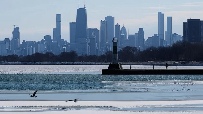 Lake Michigan is covered with snow and ice at Montrose Beach in Chicago, Illinois, on 8 February.