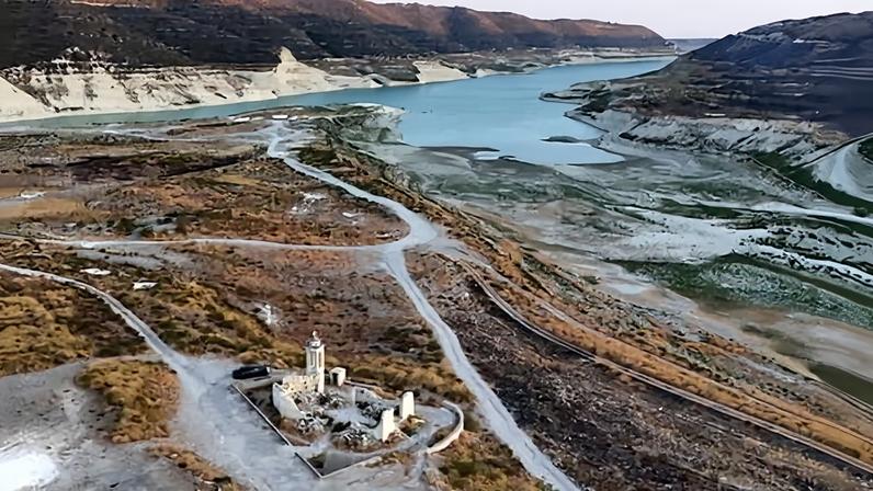 Water levels in the Kouris reservoir, near the village of Alassa in the Limassol district, have fallen so low the once-submerged St Nicholas church (seen here in August 2025) is visible.