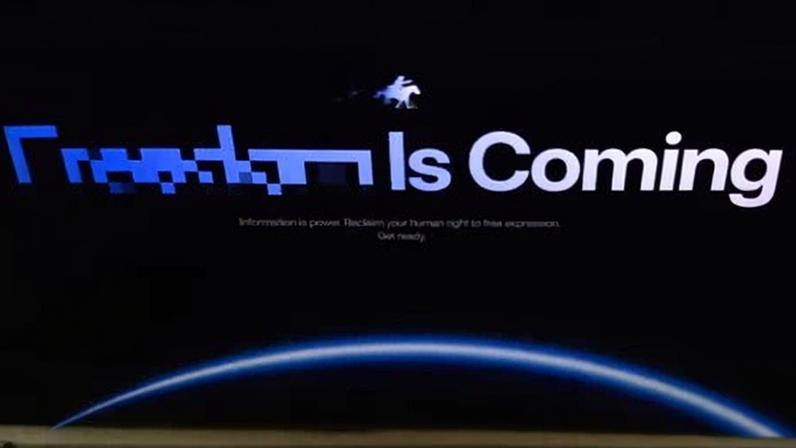 The portal’s home page reads: ‘Freedom Is Coming’, and features a galloping horse rider above a depiction of Earth.