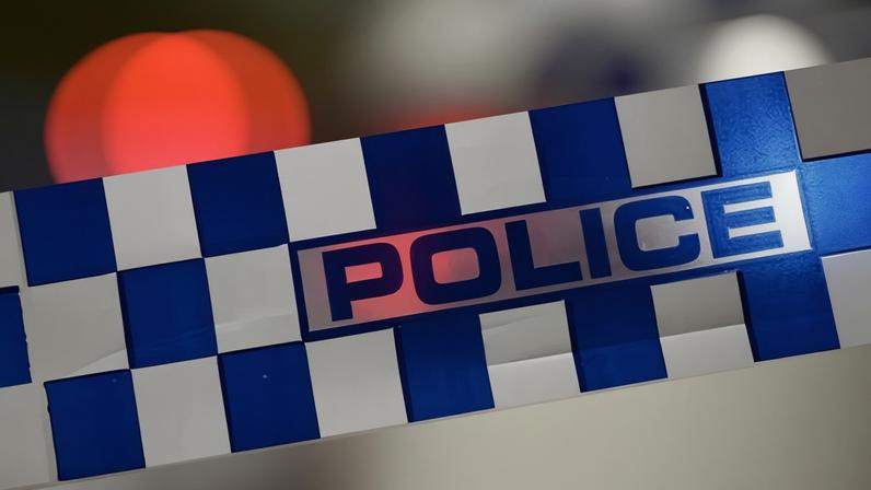 A man has been shot dead by police after reportedly breaking into a home in Tuncurry, on the NSW mid-north coast, armed with a chainsaw and a knife and stabbing a woman.