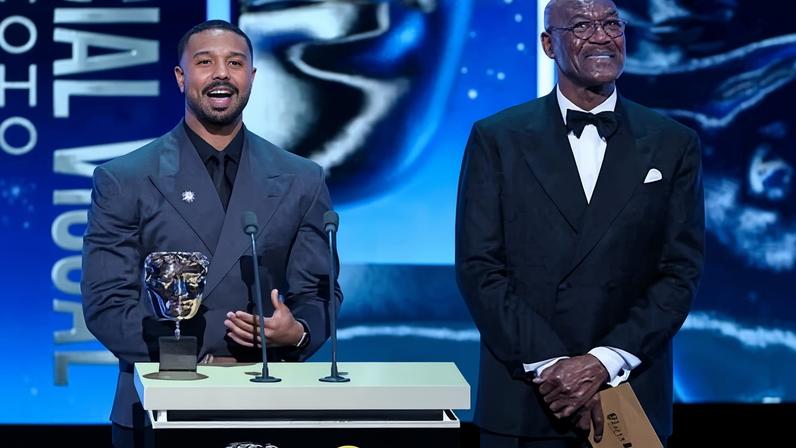 Mortal sinners … Michael B Jordan and Delroy Lindo presenting the special visual effects award, during which time John Davidson, who suffers from Tourette’s, shouted out the n-word from the stalls.