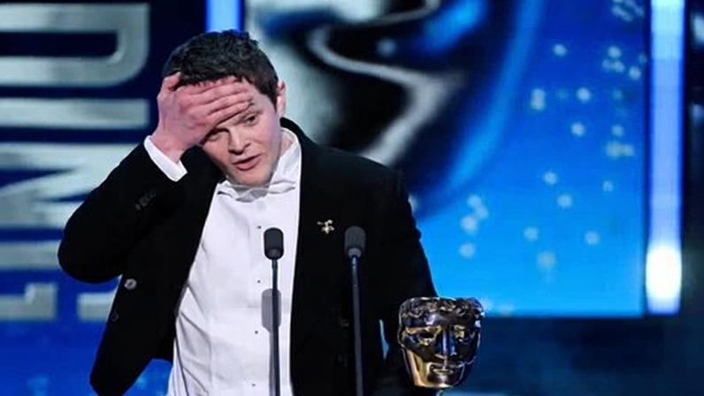 Robert Aramayo accepts the leading actor award for I Swear.