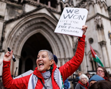 A supporter of Palestine Action after a legal challenge ruled against the decision to proscribe the group under anti-terrorism laws on Friday.