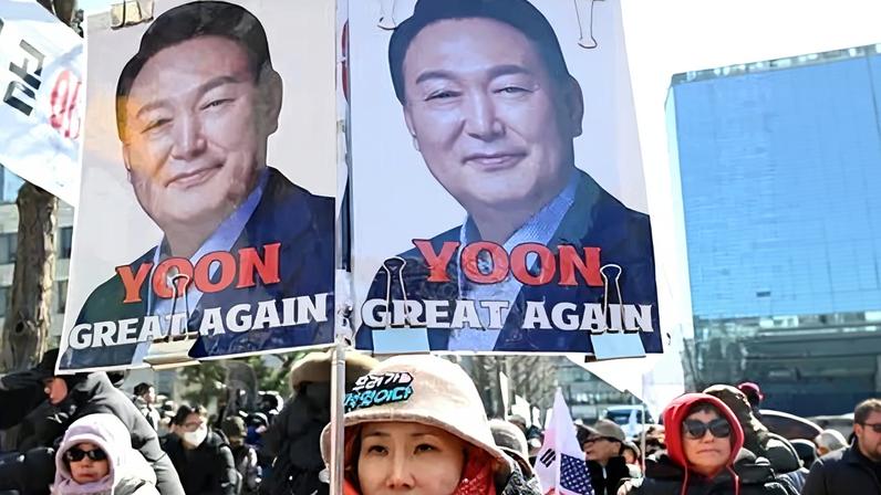A supporter of Yoon Suk Yeol outside the court in Seoul, South Korea, on Thursday. Prosecutors argued that Yoon had committed ‘a grave destruction of constitutional order’ in 2024.