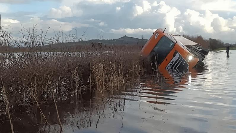 A tractor had to be used to rescue the driver from his lorry