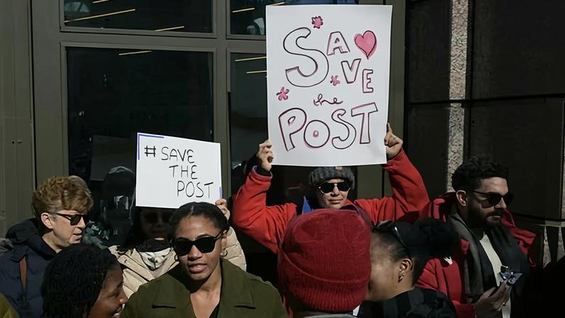 Washington Post employees, along with supporters from the Washington-Baltimore News Guild, rally outside the newspaper’s building last week.