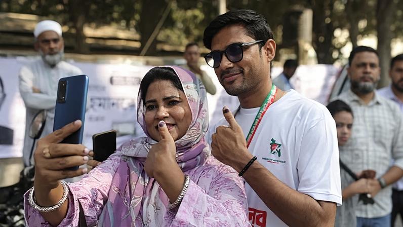 People arrive to cast their vote in the 13th general election on Thursday in Dhaka, Bangladesh.