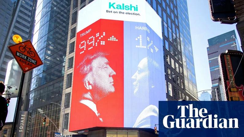 A large electronic display posting the odds of Donald Trump or Kamala Harris winning the 2024 US election