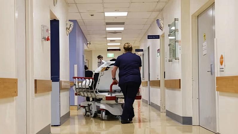 File photo of a hospital corridor. Dr Michael Byrom has been appointed to a senior clinical safety position in Queensland after previously being banned from complex surgery in NSW.