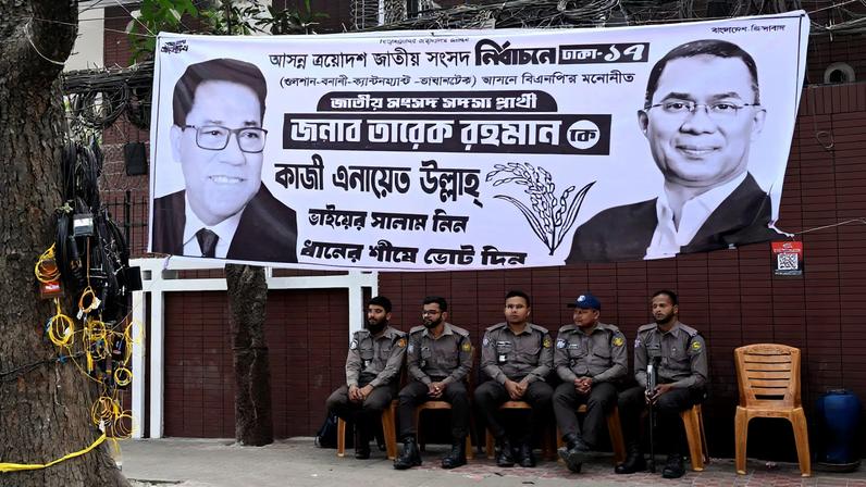 Police officers sit outside a party office of Bangladesh Nationalist Party (BNP), a day after the national election in Dhaka, Bangladesh, February 13, 2026. REUTERS/Fatima Tuj Johora