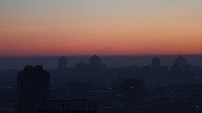 Water vapour rises from residential buildings' autonomous heating systems during a power blackout and freezing temperatures, after critical civil infrastructure was hit by recent Russian missile and drone attacks, amid Russia's attack on Ukraine, in Kyiv, Ukraine, February 3, 2026.