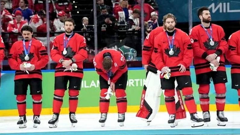 Canada react after their loss in the men’s hockey final.