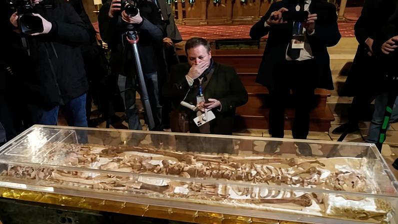 Journalists inside the Basilica of S Francis of Assisi on Saturday on the eve of the public exhibition to mark the 800th anniversary of his death in 1226.