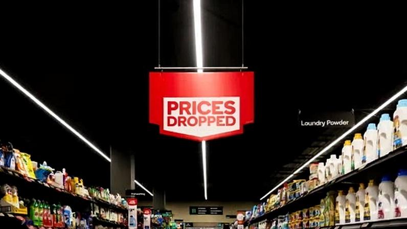 Coles and Woolworths face a legal action alleging some on-shelf prices were not real discounts.