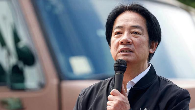 Taiwan President Lai Ching-te inspects reservists during a training session at Loung Te Industrial Parks Service Center in Yilan