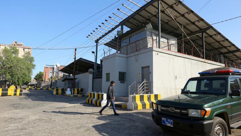 A man walks outside the United Nations compound following reports of UN staffers being detained by the Houthis, in Sanaa, Yemen October 29, 2025. REUTERS/Khaled Abdullah