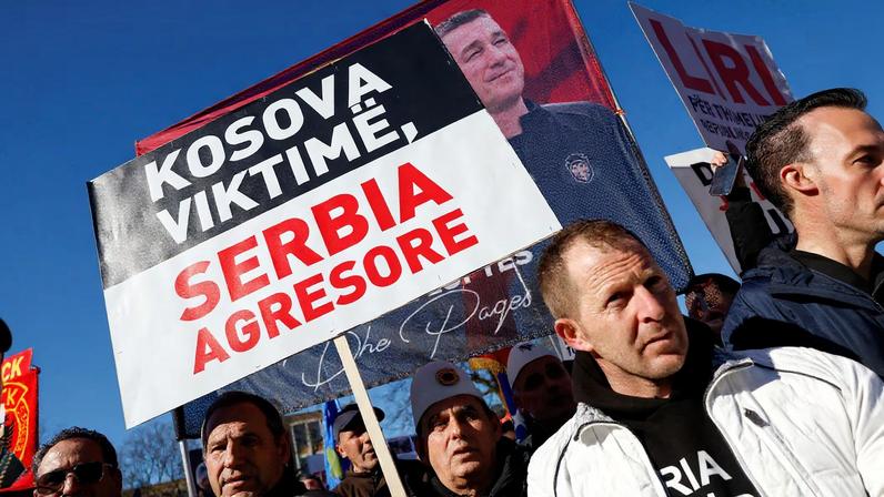 Supporters of former Kosovo President Hashim Thaci protest on the first day of his war crimes trial in The Hague, Netherlands, April 3, 2023. REUTERS/Piroschka van de Wouw/File Photo
