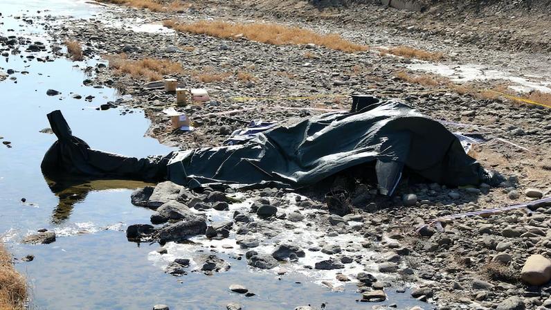 South Korean military officials secure the site where an AH-1S Cobra attack helicopter crashed in Gapyeong