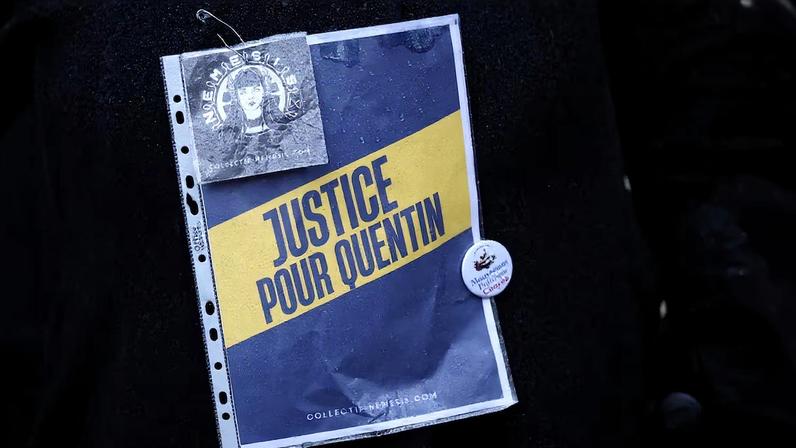 People gather to pay tribute to Quentin, an activist who died from injuries sustained during a beating, during a demonstration in Paris