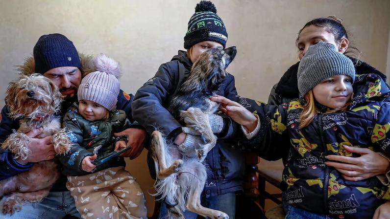 The Wider Image: A young Kyiv family adapts to beat the freeze as Russian attacks