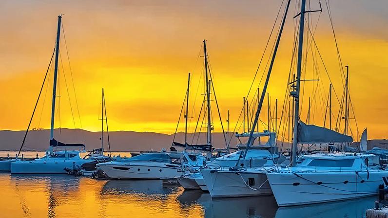 Getty Images Boats moored in Knysna's waterfront at sunset.