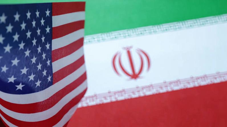 U.S. and Iran flags are seen in this illustration taken June 18, 2025. REUTERS/Dado Ruvic/Illustration