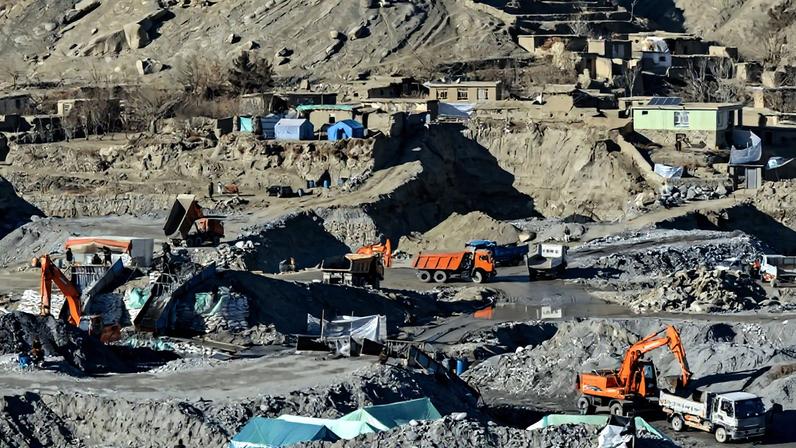 Miners work at a gold mine in the Yaftal Sufla district in Badakhshan province of Afghanistan on Jan. 11. Omer Abrar/AFP via Getty Images