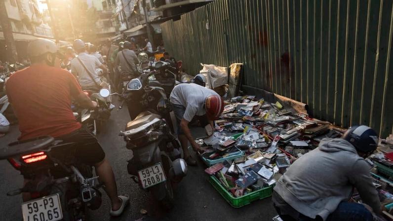 Shoppers crowd the street in Nhat Tao market, the largest informal recycling market in Ho Chi Minh City, Vietnam, Wednesday, Jan. 31, 2024. Photo by Jae C. Hong, Associated Press