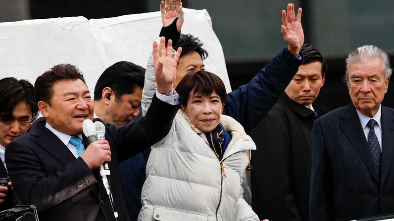Japan's Prime Minister and leader of the ruling Liberal Democratic Party (LDP), Sanae Takaichi, waves her hand during an election campaign event ahead of the February 8 snap election, in Tokyo