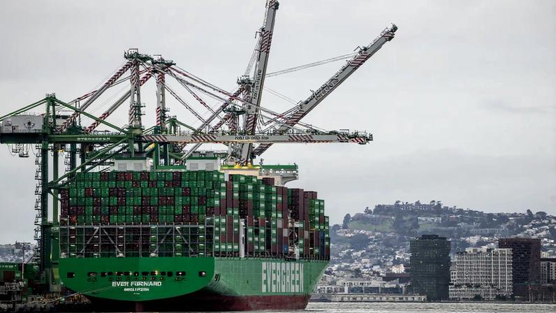 Shipping containers are stacked on a cargo ship at the port of Oakland following the Supreme Court's ruling that Trump had exceeded his authority when he imposed tariffs, in Oakland,...