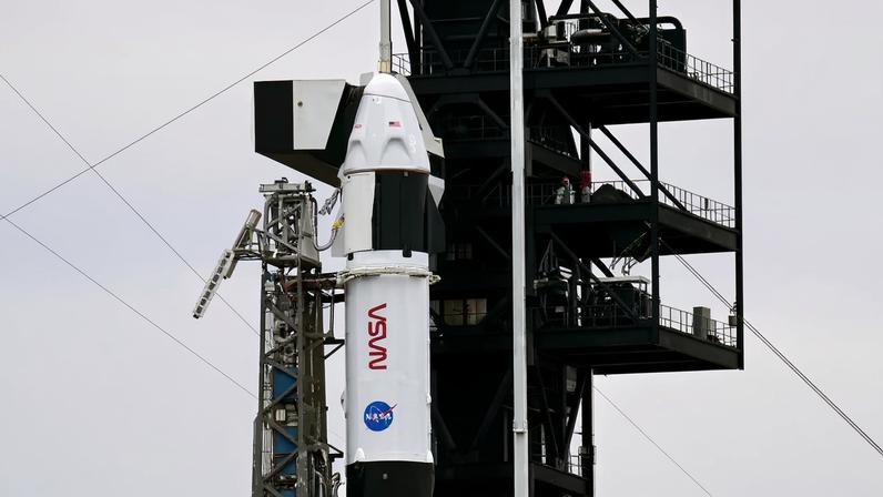 A SpaceX Falcon 9 rocket and Dragon spacecraft stands at Launch Complex 40 as preparations continue for the launch of NASA’s Crew-12 mission to the International Space Station