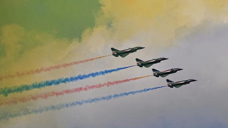 The People's Liberation Army Air Force Bayi Aerobatic Team perform during an aerial flying display at the Singapore Airshow at Changi Exhibition Centre in Singapore